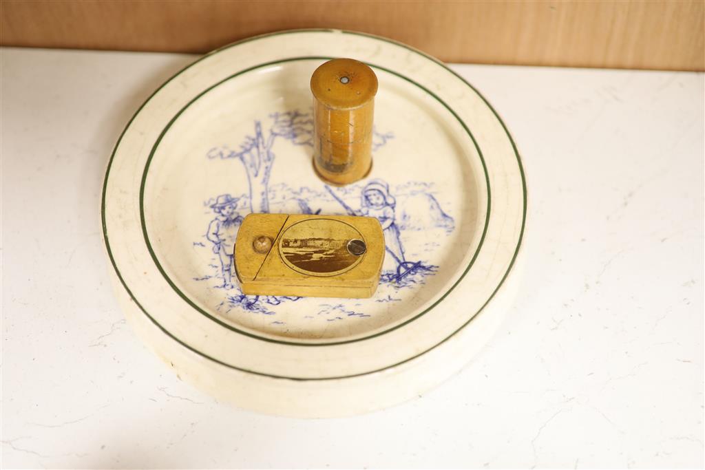 Three table bells, a porcupine quill box, a table compass and a Royal Doulton babys plate
